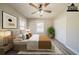 Comfortable bedroom with ceiling fan, natural light, and a spacious closet for storage at 2103 Mcafee Rd, Decatur, GA 30032