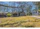 Charming single-story home with a well-maintained lawn and inviting front porch at 2103 Mcafee Rd, Decatur, GA 30032