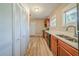 Functional kitchen layout with laminate floors, bright countertops and ample storage at 2103 Mcafee Rd, Decatur, GA 30032