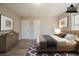 This is a virtually staged main bedroom with a large bed and dresser at 2103 Mcafee Rd, Decatur, GA 30032