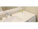 Bathroom vanity with white countertop and modern fixtures at 2229 Bigwood Trl, Atlanta, GA 30349