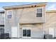 The back exterior of this home features siding, a patio door, and a white back door at 2229 Bigwood Trl, Atlanta, GA 30349