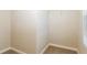 Walk-in closet with carpeted floor, white walls, and window for ample natural light at 2229 Bigwood Trl, Atlanta, GA 30349