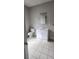 Bright bathroom featuring a white vanity and a commode at 3033 Semmes St, Atlanta, GA 30344
