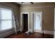 Bedroom shows natural light through windows with wooden floors and doorways at 3033 Semmes St, Atlanta, GA 30344