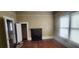 Spacious bedroom with wood floors and a fireplace feature at 3033 Semmes St, Atlanta, GA 30344