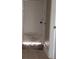 Interior shot featuring a damaged door with missing paint and visible wear near the bottom at 3033 Semmes St, Atlanta, GA 30344