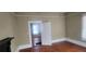 Open living room area with adjacent room views with natural light at 3033 Semmes St, Atlanta, GA 30344