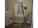 Picture of a utility room with exposed plumbing and a metal pipe at 3033 Semmes St, Atlanta, GA 30344