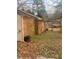 Property featuring a brick exterior and a spacious backyard at 7205 Lakeview Dr, Covington, GA 30014