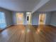Spacious living room featuring hardwood floors and an open layout, perfect for entertaining at 1600 Whisperwood Trl, Stone Mountain, GA 30088