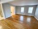 Hardwood floors and natural light enhance this inviting living space at 1600 Whisperwood Trl, Stone Mountain, GA 30088