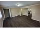 A spacious living room featuring wooden floors and a large window at 980 Linam Se Ave, Atlanta, GA 30315