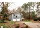 Charming two-story home featuring a two-car garage, basketball hoop and well-maintained front yard at 10945 Pinehigh Dr, Alpharetta, GA 30022