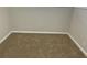 Small bedroom with neutral walls and carpet flooring at 1864 Cindy Dr, Decatur, GA 30032