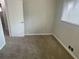 Simple bedroom with neutral walls and carpet flooring at 1864 Cindy Dr, Decatur, GA 30032