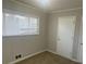 Well-lit bedroom featuring neutral walls, carpet flooring, and a closet at 1864 Cindy Dr, Decatur, GA 30032