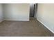 Spacious living room with neutral wall paint and carpet at 1864 Cindy Dr, Decatur, GA 30032