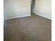 Living room with neutral walls and carpet flooring at 1864 Cindy Dr, Decatur, GA 30032