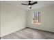 Bedroom with neutral walls, modern flooring, and ample natural light from a window at 3753 Adamsville Sw Dr, Atlanta, GA 30331
