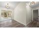 Dining area with wood-look floors and sliding doors to a screened in porch at 3753 Adamsville Sw Dr, Atlanta, GA 30331