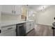 Updated kitchen features stainless steel appliances, quartz countertops and new cabinets at 3753 Adamsville Sw Dr, Atlanta, GA 30331