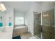 Spa-like bathroom with double sinks, a shower, and a soaking tub near a window with natural light at 4380 Serenity Lake Dr, Cumming, GA 30028