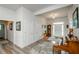 Bright foyer featuring hardwood floors and neutral decor, leading to the home's interior at 4380 Serenity Lake Dr, Cumming, GA 30028