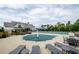 A covered community pool with lounge seating in a Gathering-friendly neighborhood at 4380 Serenity Lake Dr, Cumming, GA 30028