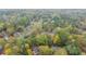 Aerial view of residential neighborhood showcasing tree-lined streets and homes at 753 Brookwood Sw Ter, Lilburn, GA 30047