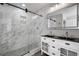 Modern bathroom with marble shower and double vanity at 1022 Washington Ave, Woodstock, GA 30188