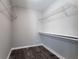 Large walk-in closet with wire shelving and hanging rod at 1022 Washington Ave, Woodstock, GA 30188