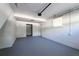 Attached garage with epoxy flooring at 1022 Washington Ave, Woodstock, GA 30188