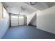Attached garage with epoxy floor and storage at 1022 Washington Ave, Woodstock, GA 30188