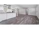 Modern kitchen with white cabinets, stainless steel appliances and an island at 1022 Washington Ave, Woodstock, GA 30188