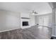 Spacious living room featuring a fireplace and French doors at 1022 Washington Ave, Woodstock, GA 30188