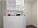 Basement closet with shelving for extra storage at 915 Rocky Creek Rd, Hampton, GA 30228