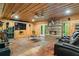 Finished basement with stone fireplace, home theater and gym at 915 Rocky Creek Rd, Hampton, GA 30228