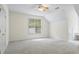 Spacious bedroom with carpet and large window at 915 Rocky Creek Rd, Hampton, GA 30228