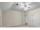 Bonus room with double doors and ceiling fan at 915 Rocky Creek Rd, Hampton, GA 30228