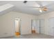 Spacious bonus room with double doors and walk-in closet at 915 Rocky Creek Rd, Hampton, GA 30228
