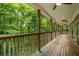 Spacious deck overlooking a wooded area at 915 Rocky Creek Rd, Hampton, GA 30228