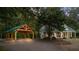 House with a carport and a long driveway leading to the front door at 915 Rocky Creek Rd, Hampton, GA 30228
