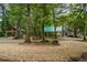 House exterior showcasing a large covered patio and a charming gazebo at 915 Rocky Creek Rd, Hampton, GA 30228