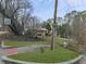 Digitally enhanced street view of the home with a lush green lawn, showcasing the neighborhood surroundings at 301 Jeanette St, Canton, GA 30114