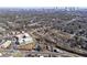 A broad aerial view showing the neighborhood, commercial buildings and the city skyline in the distance at 1470 S Gordon Sw St, Atlanta, GA 30310