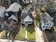 An aerial view of a home showcasing its landscaped front yard, driveway, and neighborhood surroundings at 1470 S Gordon Sw St, Atlanta, GA 30310