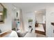 Well-lit bathroom with a soaking tub, shower with white tile, and decorative plants for a spa-like feel at 1470 S Gordon Sw St, Atlanta, GA 30310