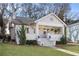 Charming white brick home with a welcoming front porch and well-manicured lawn at 1470 S Gordon Sw St, Atlanta, GA 30310