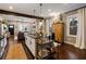 Bright open kitchen with modern appliances, dark countertops, and an island with pendant lighting at 1470 S Gordon Sw St, Atlanta, GA 30310